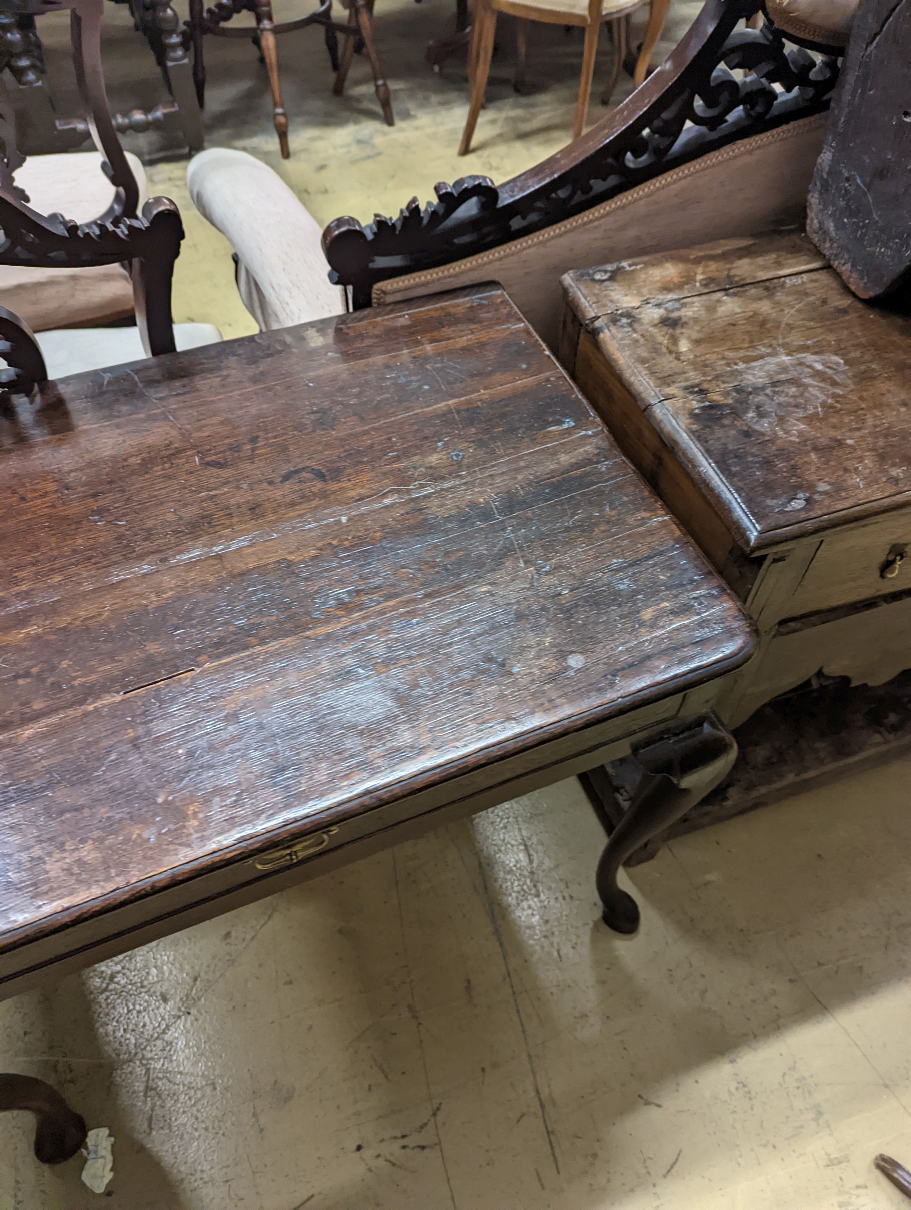 A mid 18th century oak lowboy, width 74cm, depth 50cm, height 69cm